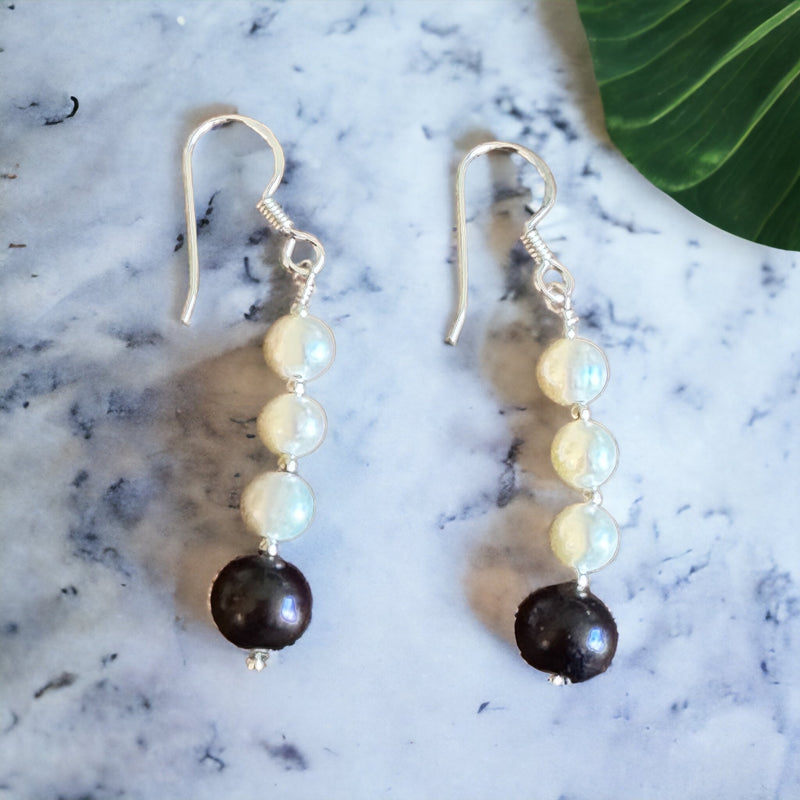 White Pearls with One Black Pearl