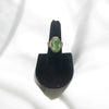 Peridot Cabochon with wrap around uncut diamonds