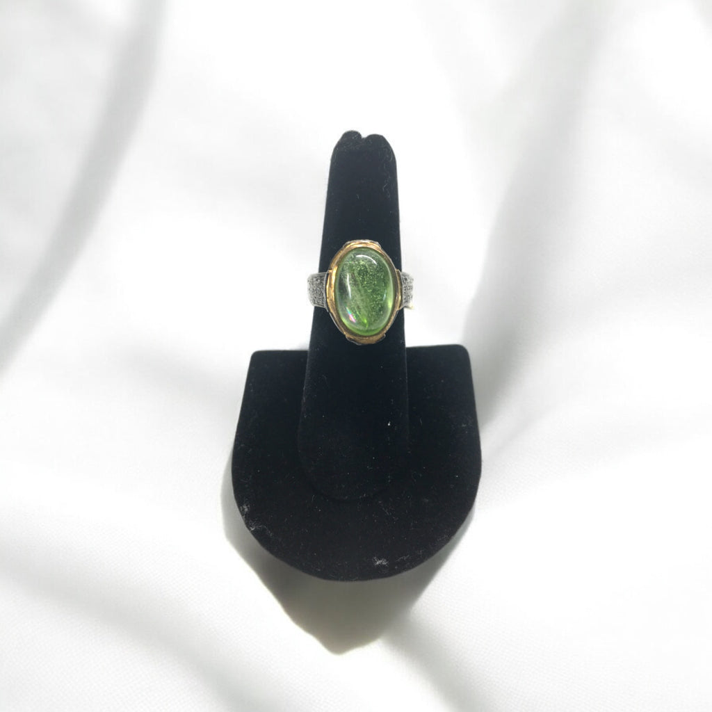 Peridot Cabochon with wrap around uncut diamonds