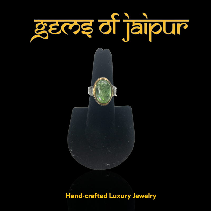 Peridot Cabochon with wrap around uncut diamonds