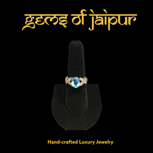 Blue Topaz Oval Cut Silver Cross